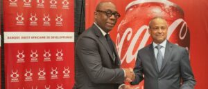 Messieurs Serge EKUE, Président de la Banque Ouest Africaine de Développement (BOAD) et Gilles GUERARD, Président du Conseil d’Administration de la société Coca-Cola Donga Bottling Company SA (CCDBC SA)